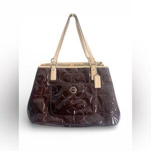 Coach Peyton embossed patent leather tote chocolate  brown color with tan trim.